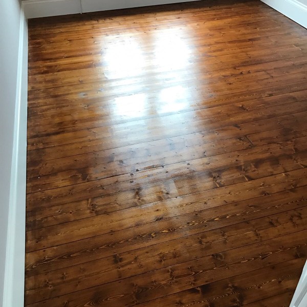 Floor sealed with lacquer after staining
