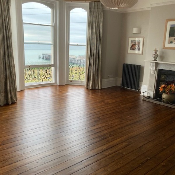 Pine Flooring in Hastings Sanded Walnut stain and lacquer finish