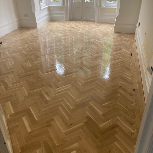 Soilid Herring Bone Parquet Installation with an oiled finish