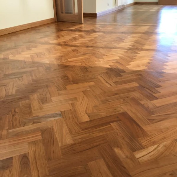 Teak Parquet Installation with Bespoke Skirting to match